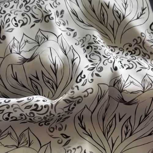 Grey and black Bird of Paradise patterned scarf, elegant accessory for gifting or personal style.