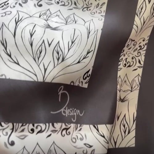 Stylish grey and black Bird of Paradise scarf, a timeless and thoughtful gift idea