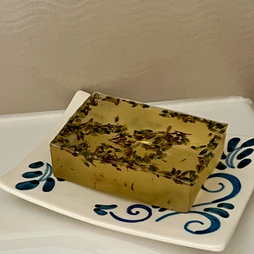 Glycerine soap bar on a soap holder