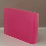 Pink soap bar on a gray background