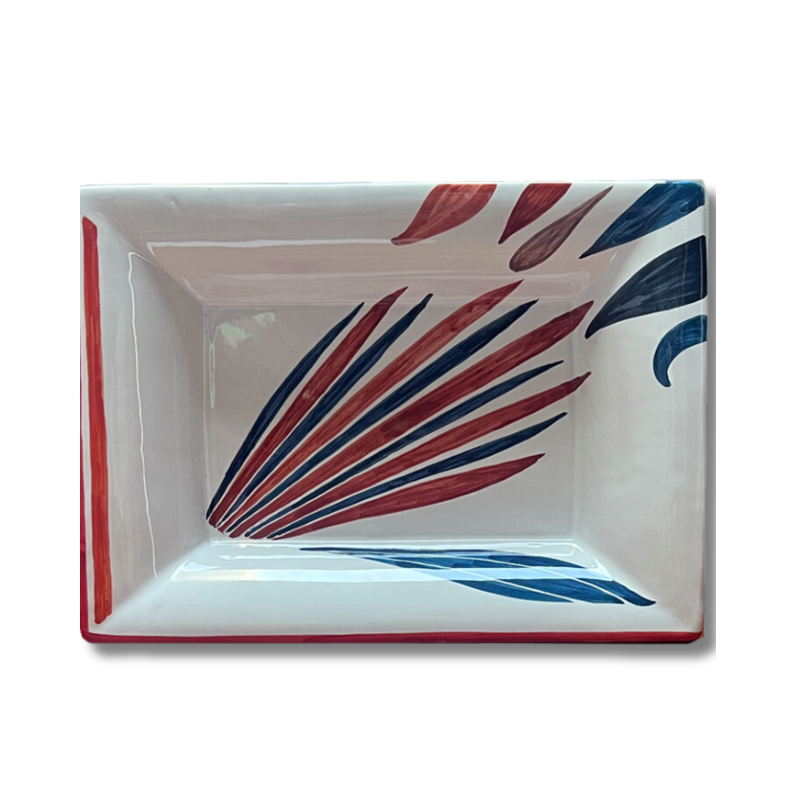 Hand-painted ceramic change tray featuring a blue and crimson design inspired by the Drifting Leaves pattern
